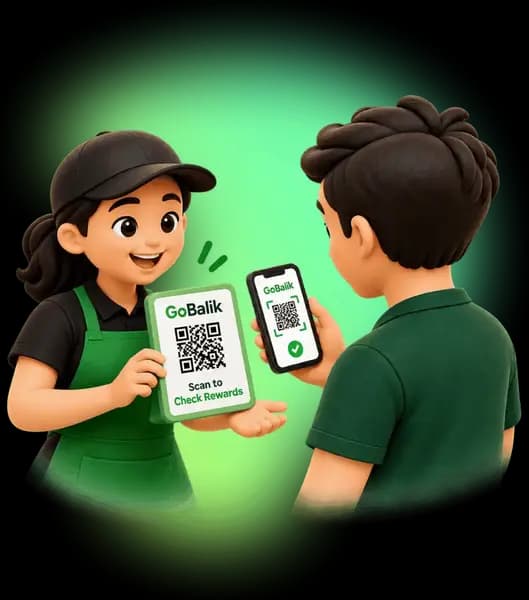 A GoBalik staff member holds up the Scan to Check Rewards QR standee while a customer scans it on their phone